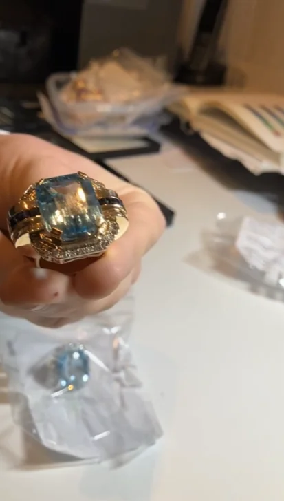 Aquamarine cocktail ring during inspection