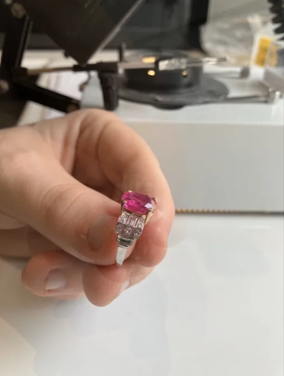 Pink sapphire ring during examination