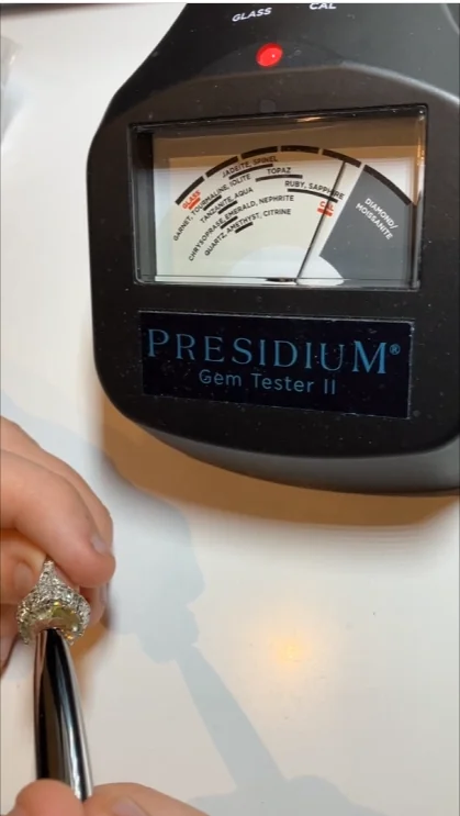 Presidium gem tester on a loose diamond